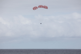 Illustration for article titled The SpaceX Dragon Splashes Down With Moustronauts And Arugula